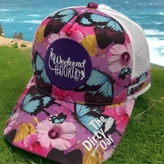 Princess Ponytail Trucker Cap on a grass background.